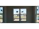 Picture window featuring view of lake at 658 Maldives Trl, Sarasota, FL 34234
