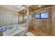 Modern bathroom featuring a glass-enclosed shower, marble vanity, and updated fixtures at 6919 Dominion Ln, Lakewood Ranch, FL 34202