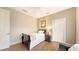 Bright bedroom features a ceiling fan, closet and wood-look flooring at 6919 Dominion Ln, Lakewood Ranch, FL 34202