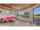 Screened lanai with comfortable seating offering views of the surrounding landscape at 6919 Dominion Ln, Lakewood Ranch, FL 34202