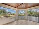 Covered lanai with scenic views of golf course and screened-in pool at 6919 Dominion Ln, Lakewood Ranch, FL 34202