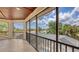 Screened lanai providing a relaxing outdoor space with views of the pool and lush landscaping at 6919 Dominion Ln, Lakewood Ranch, FL 34202