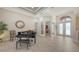 Open living area with high ceilings, piano, and lots of natural light at 6919 Dominion Ln, Lakewood Ranch, FL 34202