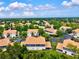 Community features well-maintained landscaping, preserve, and lake views at 7039 Strand Cir # 34-201, Bradenton, FL 34203