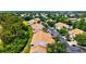 Beautiful condo community featuring lush landscaping and well-maintained exteriors with private parking at 7039 Strand Cir # 34-201, Bradenton, FL 34203