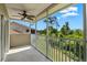 Scenic, screened-in porch offers wooded views and a charming ceiling fan at 7039 Strand Cir # 34-201, Bradenton, FL 34203