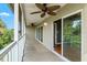 Large, screened in porch, with ceiling fan and sliding glass doors at 7039 Strand Cir # 34-201, Bradenton, FL 34203