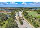 Aerial view of a landscaped gated community with beautiful lakes, golf course and lush landscaping at 7315 River Hammock Dr # 101, Bradenton, FL 34212