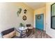 Charming condo porch featuring tiled floor and decorative accents at 7315 River Hammock Dr # 101, Bradenton, FL 34212