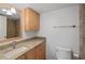 Bathroom features a granite-topped vanity and a framed mirror at 754 Pine Run Dr # 754, Osprey, FL 34229