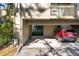 View of the parking area and car port at 754 Pine Run Dr # 754, Osprey, FL 34229