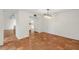 Dining room area featuring ceramic tile flooring with modern lighting fixture at 754 Pine Run Dr # 754, Osprey, FL 34229