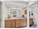 Updated bathroom boasts granite counters and access to the toilet and shower area at 7817 Pine Trace Dr # 15, Sarasota, FL 34243