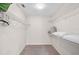 Walk-in closet with wire shelving and neutral carpeting for storage at 7817 Pine Trace Dr # 15, Sarasota, FL 34243