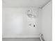 Clean and white unfinished basement with water heater at 8304 Fishhawk Ave, New Port Richey, FL 34653