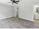 Bedroom with new floors and ensuite bath at 8304 Fishhawk Ave, New Port Richey, FL 34653