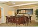 A stylish bar area with seating and elegant decor, great for entertaining guests at 1064 N Tamiami Trl # 1402, Sarasota, FL 34236