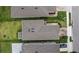 Aerial shot of a home's roof and manicured landscaping in a well-maintained neighborhood at 11430 Gallatin Trl, Parrish, FL 34219