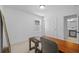 This bedroom is staged as an office with a desk, chair and closet space at 11430 Gallatin Trl, Parrish, FL 34219