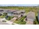 Charming two-story home with beautiful landscaping, brick paver driveway, and a well-manicured lawn at 11430 Gallatin Trl, Parrish, FL 34219