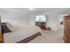 Comfortable main bedroom featuring a king-size bed and ample space for furniture and a relaxing atmosphere at 11430 Gallatin Trl, Parrish, FL 34219