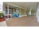 Spacious covered parking and outdoor seating area, perfect for relaxing at 1507 45Th Avenue E Dr, Ellenton, FL 34222
