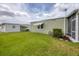 Well-maintained home with a neat lawn and landscaping, showcasing the property's curb appeal and charm at 1507 45Th Avenue E Dr, Ellenton, FL 34222