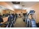 A community gym with workout equipment and mirrors for exercise at 1507 45Th Avenue E Dr, Ellenton, FL 34222