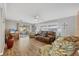 Cozy living room with hardwood floors and comfortable seating at 1507 45Th Avenue E Dr, Ellenton, FL 34222