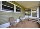 Relaxing screened porch with comfortable seating, perfect for enjoying the outdoors in peace and comfort at 1507 45Th Avenue E Dr, Ellenton, FL 34222