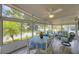 Bright sunroom with stylish furniture and a view of the outdoors at 1507 45Th Avenue E Dr, Ellenton, FL 34222