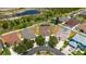 Aerial shot of home featuring manicured lawn, a sport court and convenient street parking at 1657 Bonita Bluff Ct, Ruskin, FL 33570