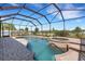 Inviting screened pool and spa, perfect for relaxing and entertaining outdoors at 1657 Bonita Bluff Ct, Ruskin, FL 33570