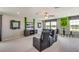 Game room with foosball table, TV, and comfortable seating, perfect for entertainment and relaxation at 18110 Metado Dr, Lakewood Ranch, FL 34211