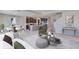 Spacious living room showcasing open floor plan, modern decor, kitchen and staircase at 18114 Metado Dr, Bradenton, FL 34211