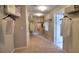 Spacious walk-in closet with carpeted floors and plenty of shelving and storage space at 18114 Metado Dr, Bradenton, FL 34211