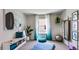 Bright yoga room featuring bench seating, natural light, yoga mat, and exercise ball at 18219 Wheathouse Pl, Lakewood Ranch, FL 34211