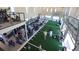 Spacious multi-level gym with a variety of fitness equipment and an athletic field at 18227 Wheathouse Pl, Lakewood Ranch, FL 34211
