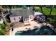 A captivating aerial view showcasing the home's backyard, pool, and neighborhood at 1830 Virginia Dr, Bradenton, FL 34205