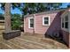 Cozy backyard featuring a wooden deck perfect for outdoor entertaining at 1830 Virginia Dr, Bradenton, FL 34205