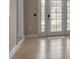 Bright room with French doors, tile flooring, and neutral paint at 1830 Virginia Dr, Bradenton, FL 34205