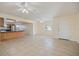 Bright open-concept living space features tile flooring and lots of natural light from windows at 1856 Wharf Rd, Sarasota, FL 34231