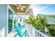 Inviting balcony with comfortable seating and tropical views perfect for relaxation at 212 72Nd, Holmes Beach, FL 34217