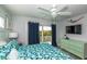 Bright bedroom featuring coastal decor, a light colored dresser, and natural light at 212 72Nd, Holmes Beach, FL 34217