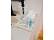 Close-up of bathroom counter featuring designer soap and lotions, along with plush towels for a spa-like feel at 2300 Stratford Dr, Sarasota, FL 34232