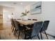 Elegant dining room featuring a modern table, stylish seating, and tasteful decor at 2300 Stratford Dr, Sarasota, FL 34232