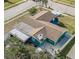 Drone shot displaying home's roof, backyard, and positioning among neighboring properties at 2402 16Th W St, Palmetto, FL 34221