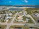 Lovely homes with pools and well-kept lawns, nestled in a picturesque neighborhood, offering a tranquil lifestyle by the water at 2402 16Th W St, Palmetto, FL 34221