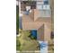 Aerial view of a home with a backyard pool, lush landscaping, and a well-maintained roof at 2402 16Th W St, Palmetto, FL 34221
