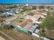 Overhead view showing the house layout, including landscaping, fencing, and neighborhood features at 2402 16Th W St, Palmetto, FL 34221